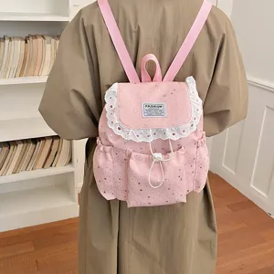 Sac à dos rose mignon pour femme avec dentelle et étoiles, joli cartable élégant pour le quotidien.