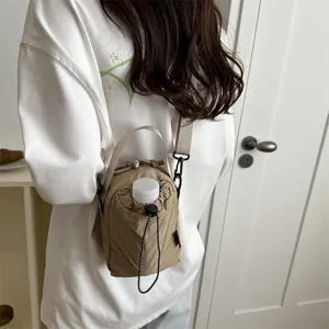 Borsa leggera color crema per bottiglia d'acqua borsa a tracolla casual da donna
