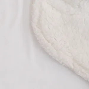 Thick newborn baby swaddle blanket sherpa sleeping bag detail texture view soft white fabric