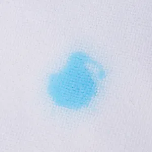 White microfiber cleaning cloth detail texture showing absorbent performance clearly.