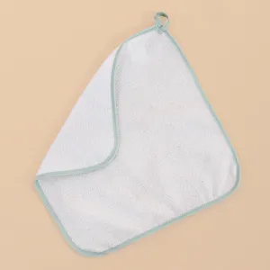 Microfiber cleaning cloth with green edge and hanging loop for home kitchen detail view.