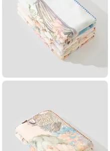 Detailed view of soft baby blanket featuring cute vintage illustration, cozy plush fleece.