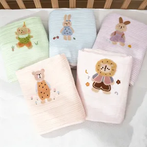 Soft breathable baby gauze blanket with cute cartoon embroidery, perfect for kindergarten use.