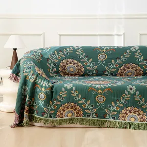 Cotton gauze sofa blanket with boho floral pattern and fringe, soft summer cool nap throw.