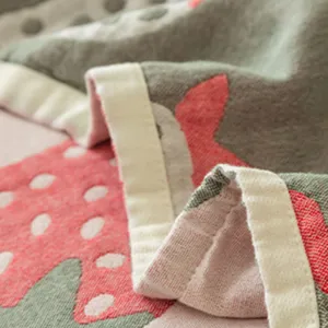 Pure cotton gauze blanket texture close-up, soft breathable summer air conditioning quilt cover.