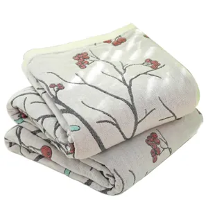 Pure cotton gauze summer air conditioning blanket, folded soft floral print quilt, main view.