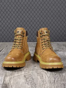 Men winter Martin boots detail showing high top fleece lined design with durable rubber sole.
