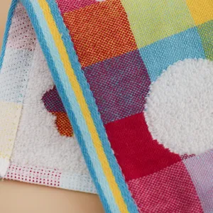 Detailed close-up view of soft colorful cotton baby square towel showcasing fine woven texture.