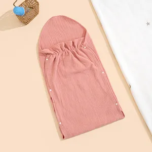 Details of the soft cotton gauze baby sleeping bag, breathable anti-kick design for newborns.