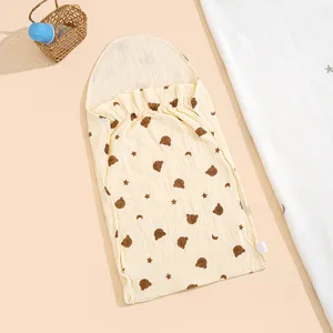 Baby sleeping bag detail, soft pure cotton gauze with cute bear pattern, breathable design.