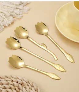 Gold stainless steel tulip shaped long handle stirring spoon detail view for coffee and tea