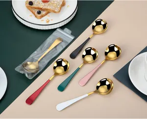 Stainless steel gold round spoon set detail showing vibrant colorful handles polish.