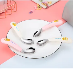 Stainless steel kids spoon and fork set detail, featuring cute cartoon cat handle design.
