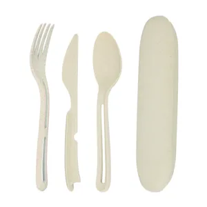 Portable wheat straw tableware set with fork knife spoon and storage case for outdoor travel.