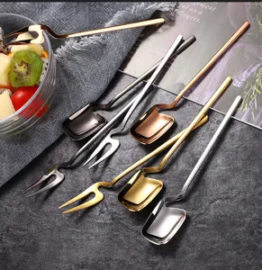 Stainless steel spoon and fork detail, creative hanging design, durable kitchen tableware display.