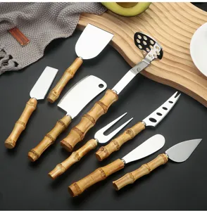 Stainless steel cheese knife set with natural bamboo handles, kitchen multi-tool cheese cutter.