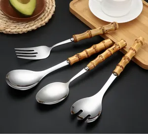 Stainless steel tableware set with natural bamboo handles, elegant and durable for daily dining use.