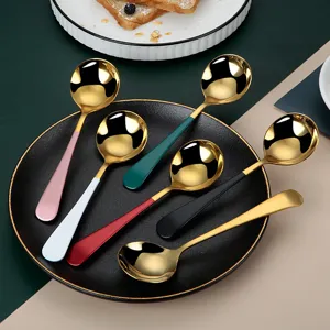 Gold stainless steel round spoons set with colorful handles, perfect dessert and soup spoons.
