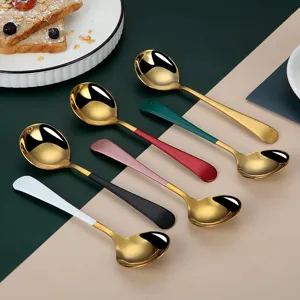 Stainless steel golden round spoons with colorful handles, perfect for desserts and home use.
