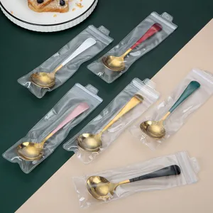 Korean style stainless steel round spoon with colorful handle and gold bowl for dessert and home use.