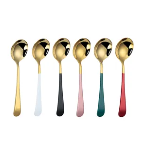 Set of 6 stainless steel Korean round spoons with gold bowls and colorful handles for home dessert use.