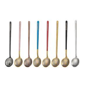 Stainless steel coffee spoon with creative shocked face pattern and long handle for daily use.