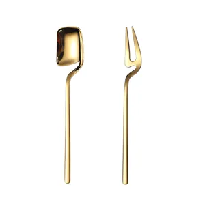 Gold stainless steel creative coffee spoon and fruit fork set, hanging mug design main view.