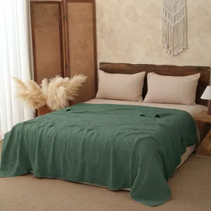Cozy pure cotton six-layer gauze blanket in deep green, soft summer quilt detail view.