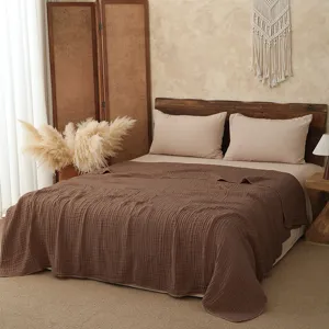 Cozy solid brown cotton six-layer gauze summer air conditioning blanket and bed cover.