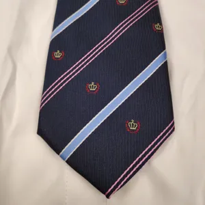 Dark blue striped tie with crown embroidery, stylish school uniform JK necktie accessory.