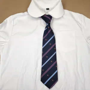 Classic white student uniform shirt paired with a stylish navy blue striped crown tie.