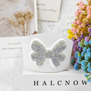 Silicone cup sleeve with rhinestone bow decoration, approx 7.5cm Stanley accessory cover.