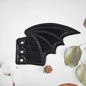 Black bat wing shoe lace charm DIY embroidery accessory for Halloween and gothic styles.