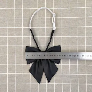Black Japanese JK sailor uniform bow tie with adjustable strap and size measurement ruler.