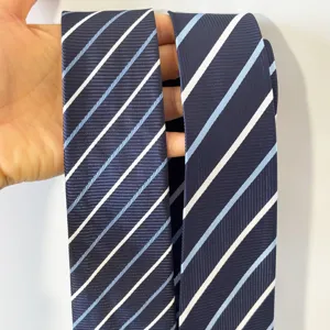 Men's business navy blue striped tie detail view, classic diagonal pattern design for formal wear.