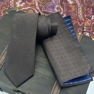 Men's business jacquard necktie and pocket square set in brown with blue floral pattern.