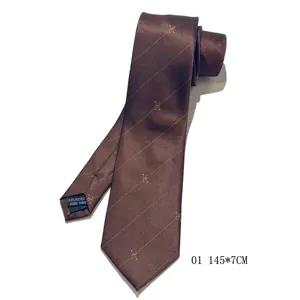 Retro brown silk tie with classic H monogram pattern, elegant business accessory for men.