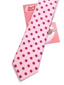Close-up detail of a raspberry pink women's necktie featuring vibrant magenta polka dots.