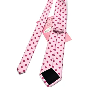 Raspberry pink polka dot tie for women, stylish vintage polyester woven necktie accessory.