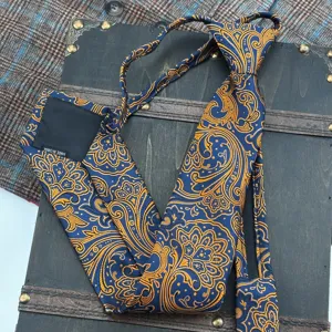 Blue and gold paisley pattern detail of luxury men zipper necktie with vintage court style.