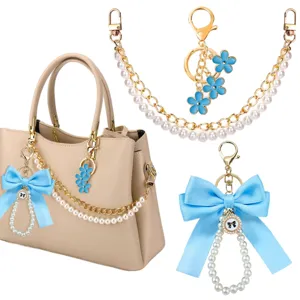 Elegante parelketting en blauwe strik handtas hanger, schattige bloem sleutelhanger voor tassen.