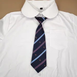 White student uniform shirt with a stylish striped tie, featuring cute crown embroidery details.