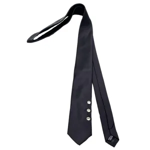 Black punk style necktie with three metal grommets, trendy dark alternative fashion accessory.