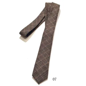 Vintage brown plaid necktie, classic retro style men accessory for formal and casual wear.