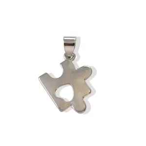 Silver puzzle piece pendant with heart cutout, DIY necklace and earring jewelry accessory.