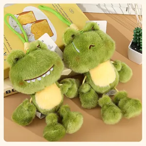 Cute plush frog keychain detail view, soft stuffed animal bag pendant with hanging strap.