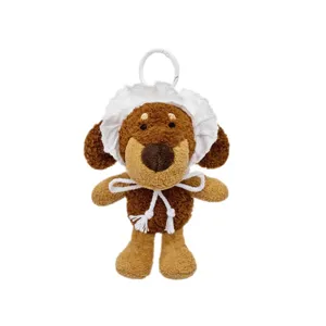 Simpatico ciondolo borsa cucciolo di peluche marrone con cuffietta bianca volant e anello zaino.