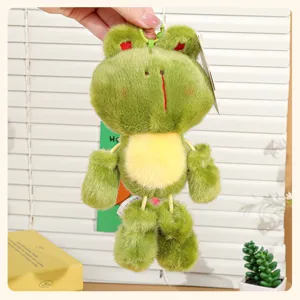 Cute mini dangling leg frog plush toy keychain bag pendant detail shot showcasing soft green fabric.