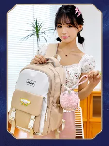 Mochila de lona casual con lindo llavero de unicornio de peluche, mochila de moda para la escuela.