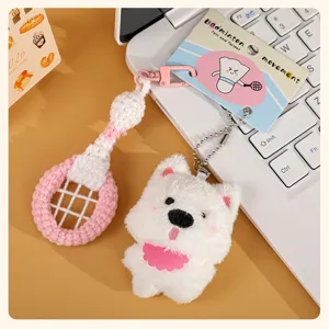 Cute plush puppy and knit badminton racket keychain bag charm accessory detail view.